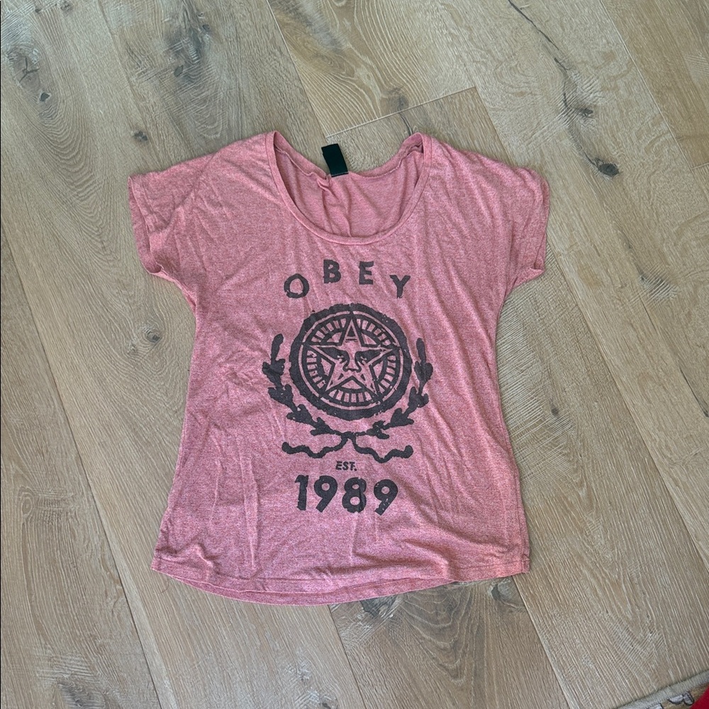 Obey Women's Short Sleeve Graphic Tee in heathered red/ Pink with Black Print